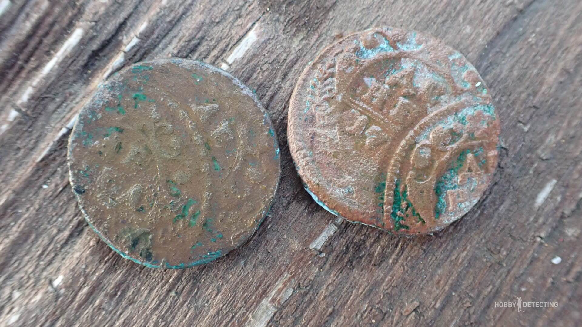 Cleaning copper coins in soapy water