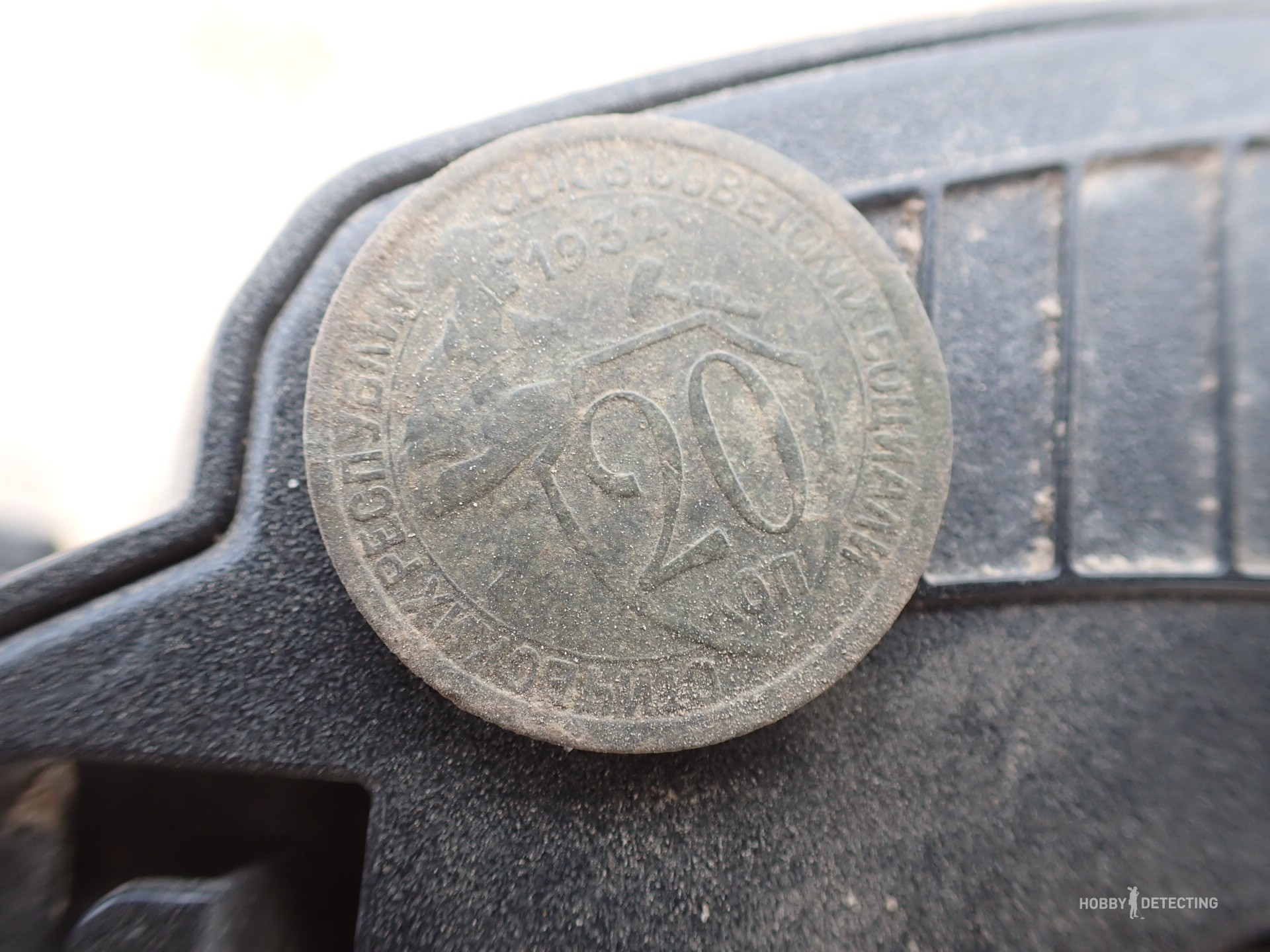 How does plowing a field affect the appearance of “new” coins?