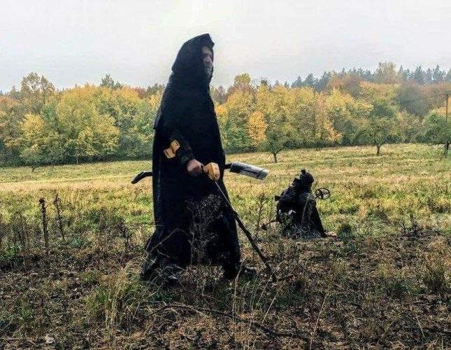 Woman with metal detector